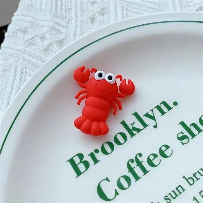 5 adorables protège-câbles en forme d'animaux marins - design crabe rouge
